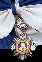 Grand Cross with Gold Star: Badge